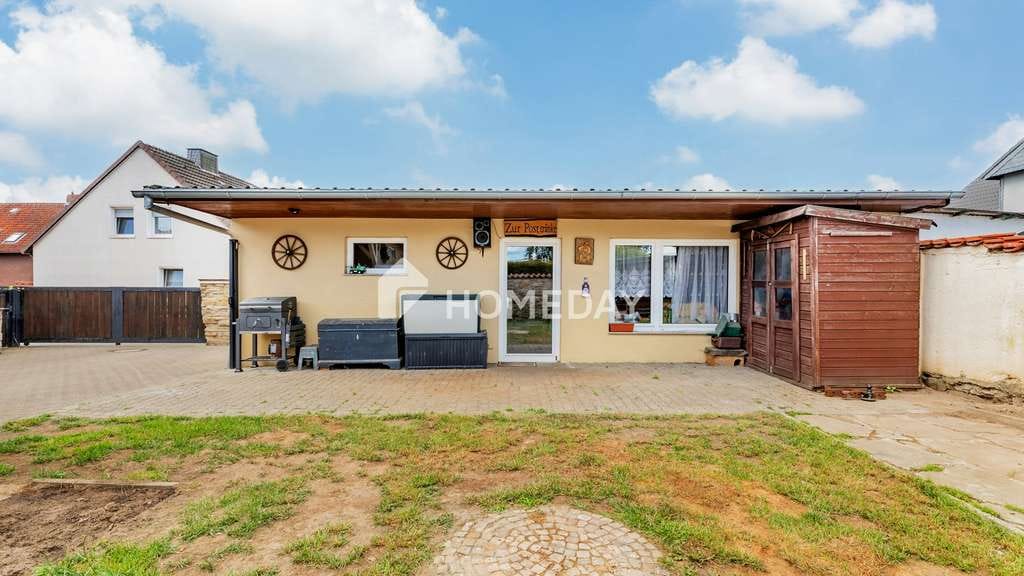 Immobilie in Grafhorst - Familienfreundliches Eigenheim mit Nebenhaus, Terrasse und Carport - Bild 1