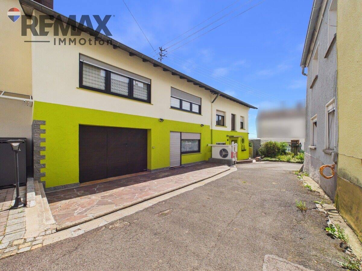 Immobilie in Mettlach - Großzügiges Wohnhaus mit moderner Wärmepumpe und PV-Anlage in Orscholz - Bild 1