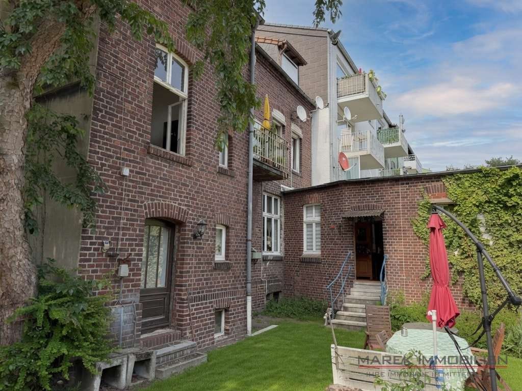 Immobilie in Datteln - Repräsentatives Dreifamilienhaus von 1908 mit historischem Charme, Garten und rückwärtigem Anbau - Bild 1