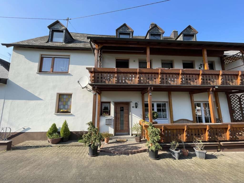 Immobilie in Osann-Monzel - Mehrfamilienhaus mit ehemaliger Ladenfläche - Bild 1