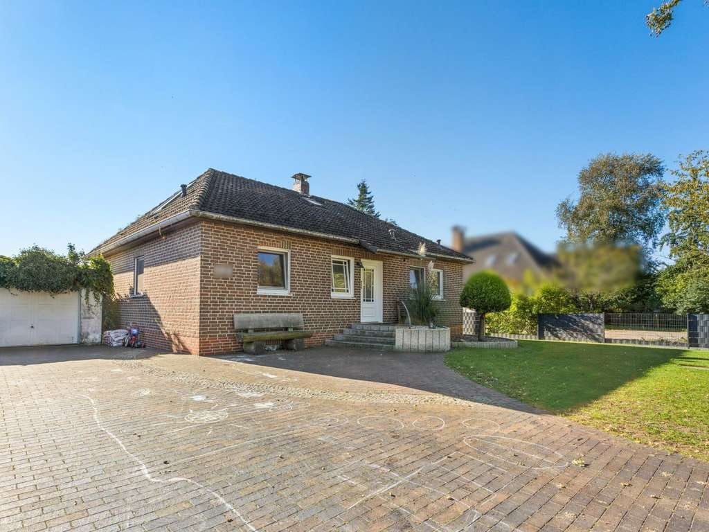 Immobilie in Lilienthal - Einziehen und Wohlfühlen – Einfamilienhaus mit großzügigem Garten in Lilienthal-Worphausen - Bild 0