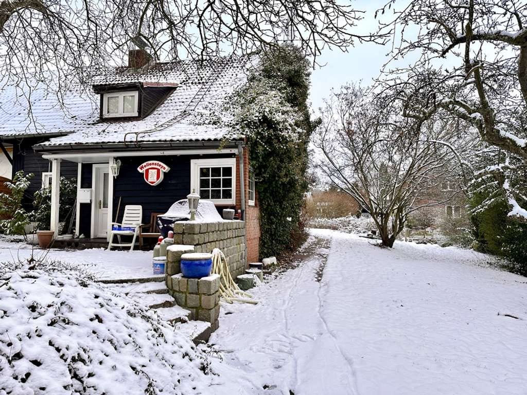 Immobilie in Scharbeutz - Wohnen im alten Garten - DHH mit Charme - Bild 1