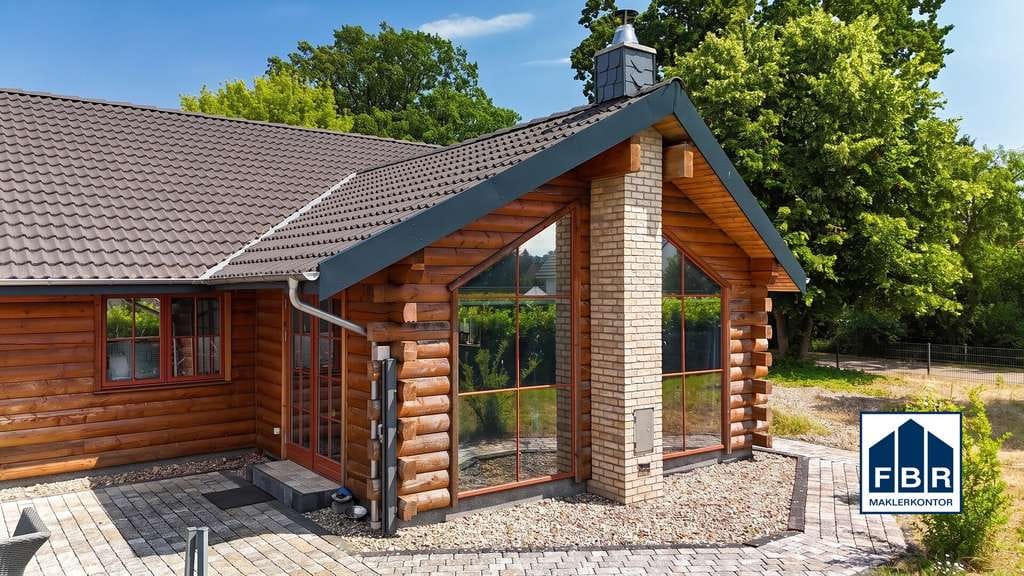 Immobilie in Uelitz - Blockhausarchitektur mit modernem Innenleben auf ca. 2.600 m² großem Grundstück - Bild 4