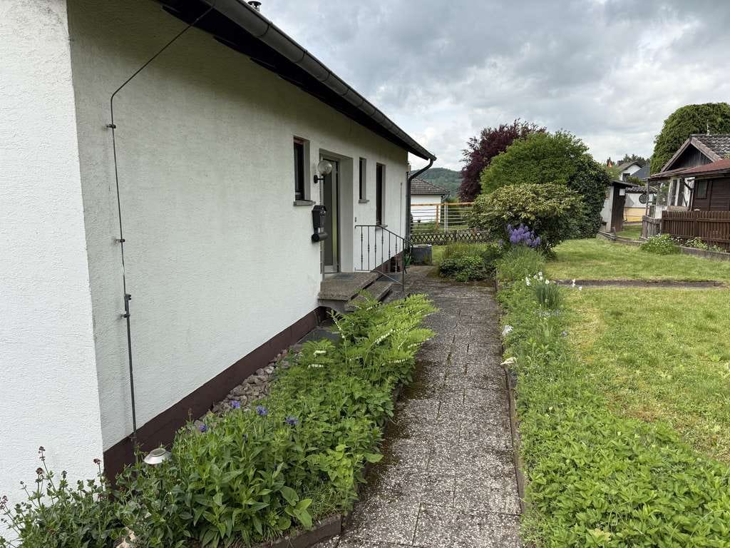 Immobilie in Wehretal - Solides Einfamilienhaus mit Garage in bester Wohnlage von Reichensachsen - Bild 4