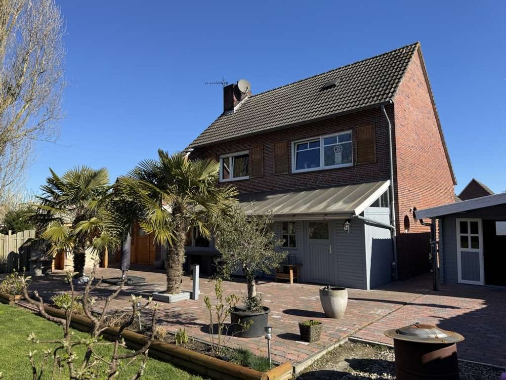 Immobilie in Südbrookmerland - Großzügiges Einfamilienhaus mit Wintergarten, schönem Garten und Garage in Sackgassenlage - Bild 3