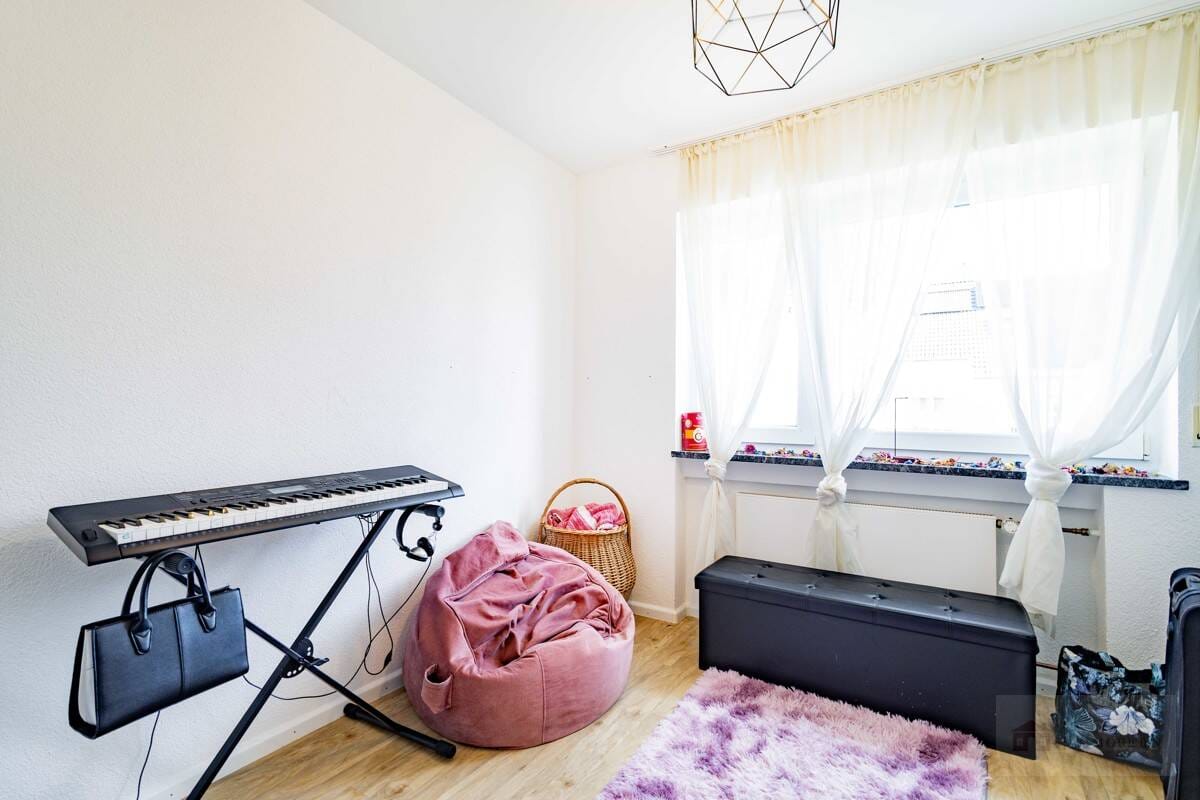 Immobilie in Neuenburg am Rhein - Saniertes Mehrfamilienhaus mit 3 Wohneinheiten in zentraler Lage - Bild 3