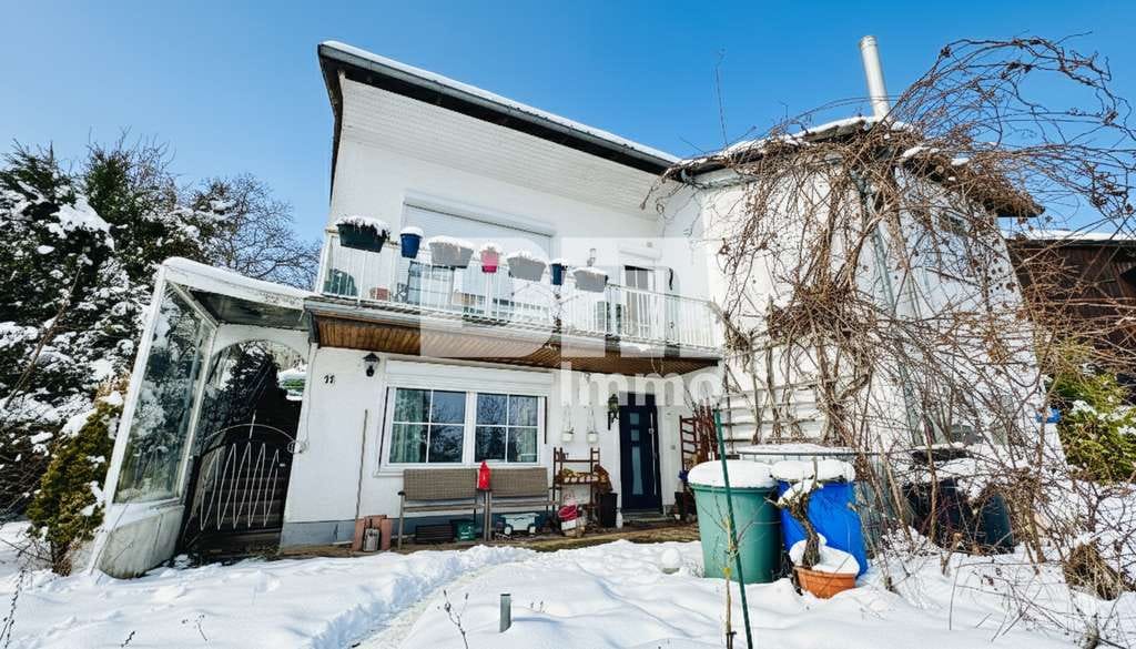 Immobilie in Ahnatal - Umfangreich saniertes EFH inkl. PV-Anlage, Terrasse, Wintergarten und Garage + Panoramablick - Bild 1