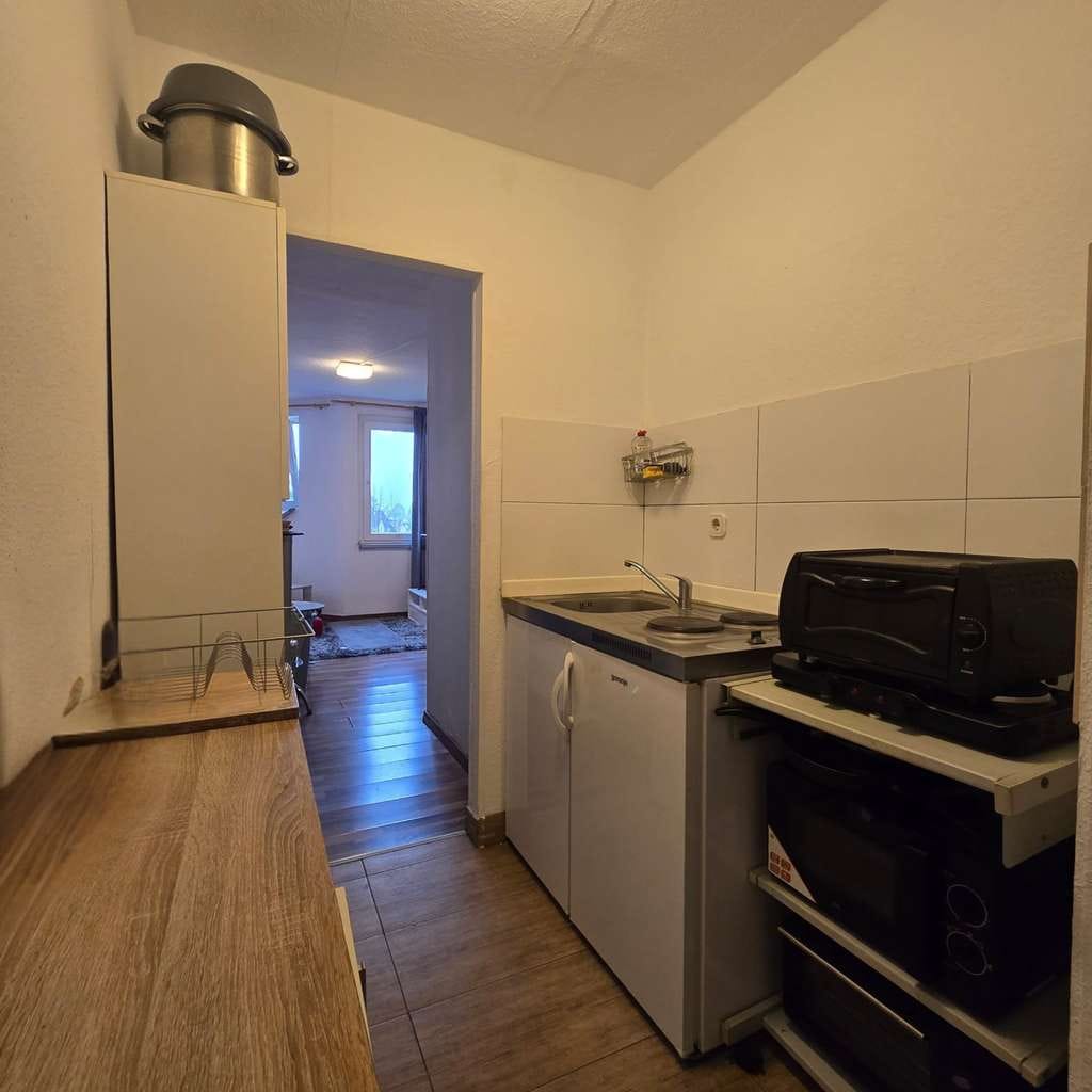 Immobilie in Rüsselsheim am Main - Effizient geschnittene 1-Zimmer-Wohnung im 4. Obergeschoss mit separater Bettnische und Balkon - Bild 2
