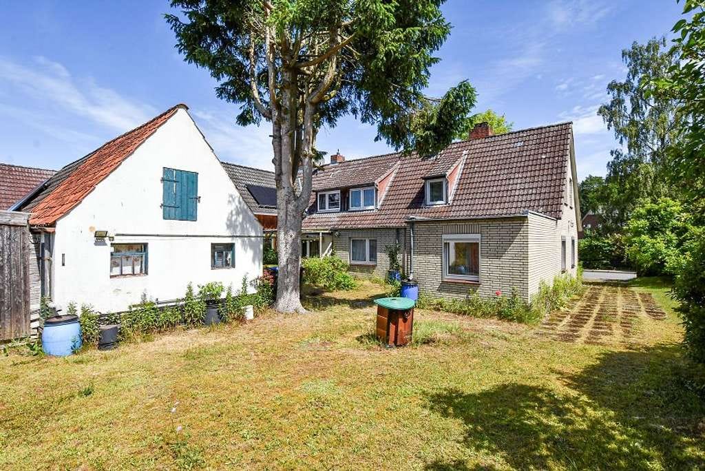 Immobilie in Groß Grönau - Renovierungsbedürftige DHH mit weitläufigem Grundstück in Groß Grönau! - Bild 2