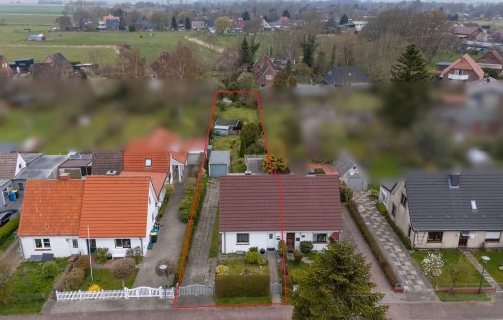 Immobilie in Groven - Solide Doppelhaushälfte mit weitläufigem Grundstück und Modernisierungspotenzial in Lunden - Bild 1