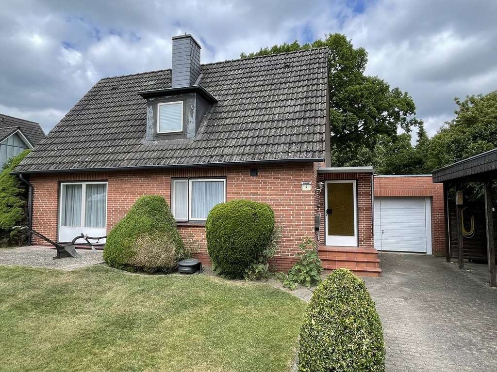 Immobilie in Schmalfeld - Schmalfeld: Großes, parkähnliches Grundstück mit gemütlichem Einfamilienhaus! - Bild 1