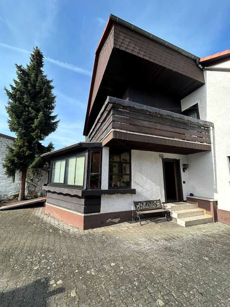 Immobilie in Dettenheim - Solides und gepflegtes Einfamilienhaus mit Garten - Bild 2