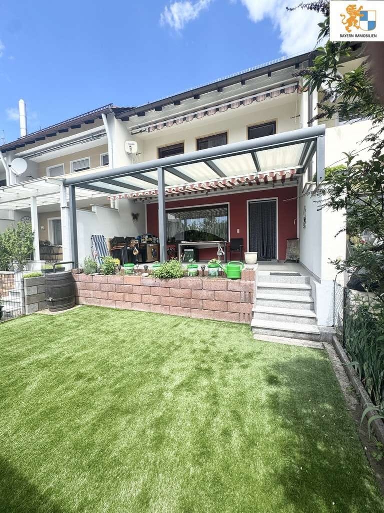 Immobilie in Feucht - Attraktives Reihenmittelhaus mit ausgebautem Studio, Kachelofen und liebevoll angelegtem Garten - Bild 0