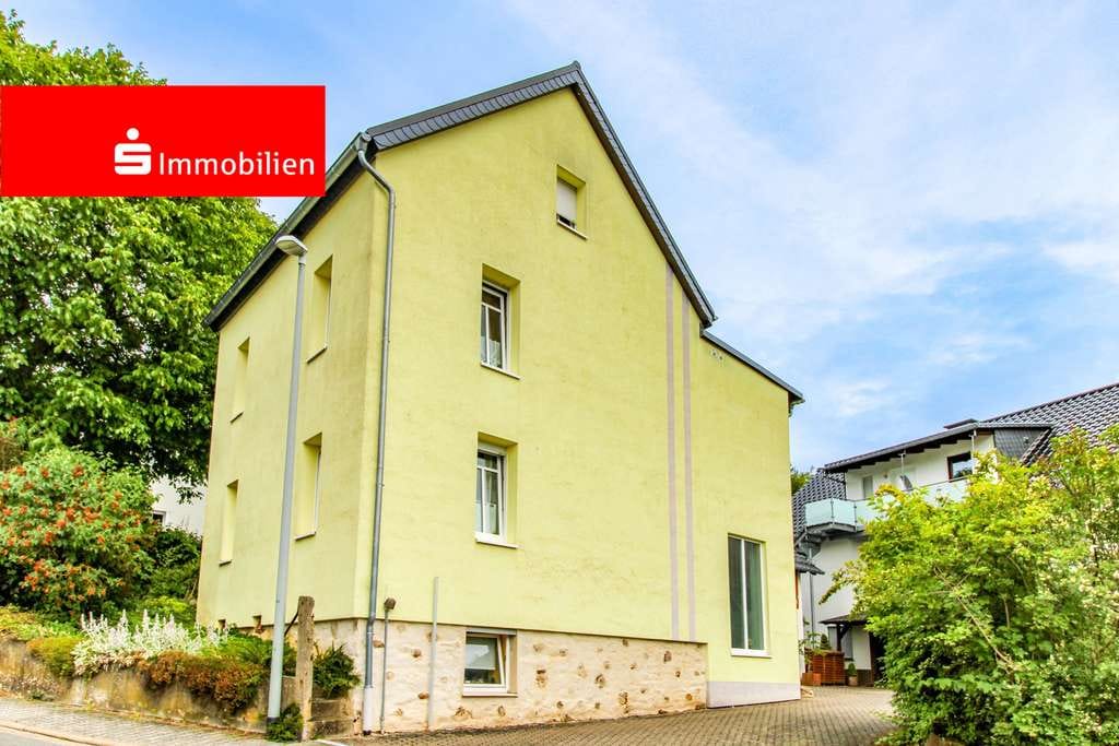 Immobilie in Hünfelden - Charmantes Einfamilienhaus mit Garage, Ausbaureserve im Dachgeschoss und schönem Garten in Ohren  - Bild 0