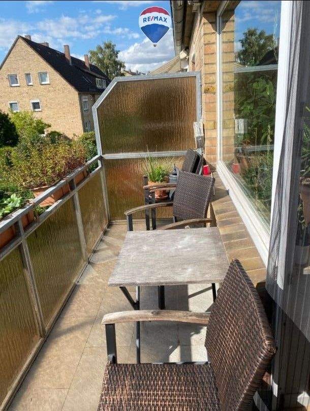 Immobilie in Ratekau - Attraktive 4-Zimmer-Maisonettewohnung mit Balkon und 2 Garagen in ruhiger Lage - Bild 2