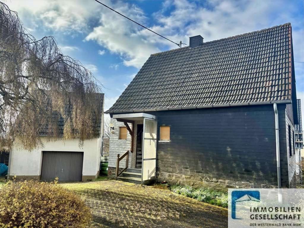 Immobilie in Birken-Honigsessen - Kompaktes Einfamilienhaus mit sep. Garagengebäude sowie großzügigem Grundstück - Bild 0