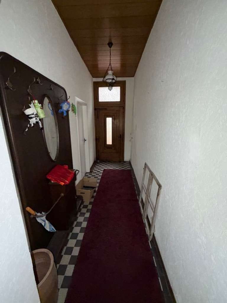Immobilie in Kevelaer - Großzügiges Reihenmittelhaus mit Garten und Ausbaureserve in Kevelaer-Wetten - Bild 1