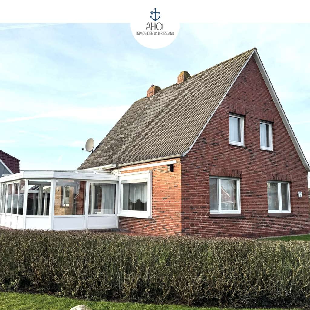 Immobilie in Krummhörn - Gepflegt und küstennah: Einfamilienhaus mit Wintergarten, Garage und Garten - Bild 0