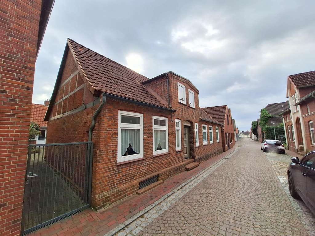 Immobilie in Meldorf - Wohn und Geschäftshaus mit 2 weiteren Gebäude - Bild 1
