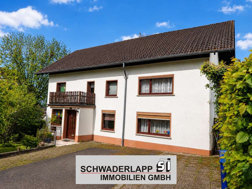 Immobilie in Marienrachdorf - Gemütliches Einfamilienhaus mit Nebengebäude auf großem Grundstück - Bild 0