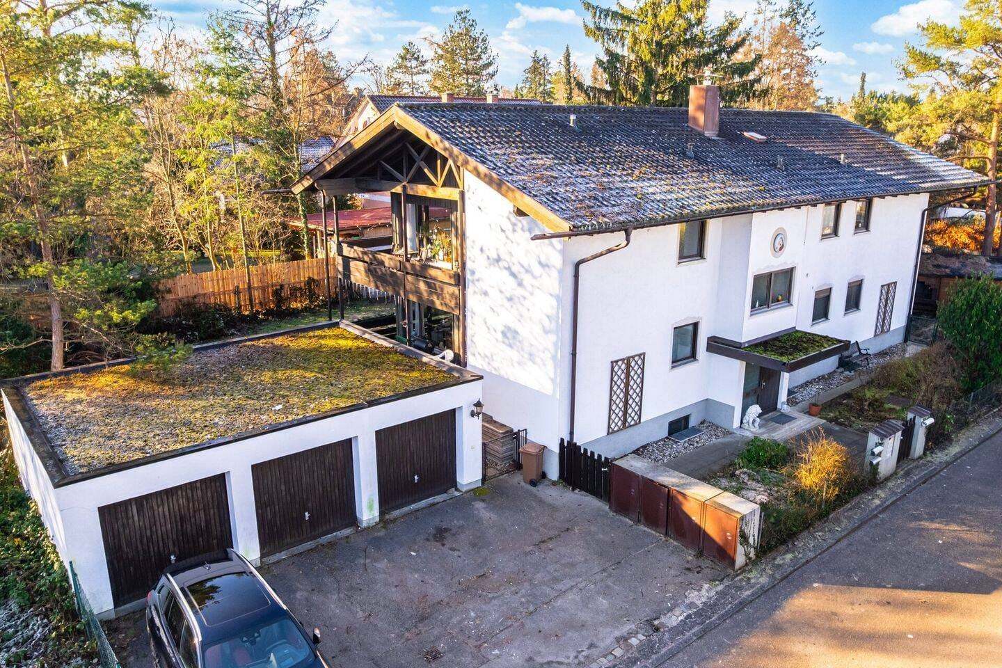 Immobilie in Gräfelfing - Zwei Etagen, ein großes Familienkapitel - vielseitiges Mehrfamilienhaus - jetzt erleben - Bild 1