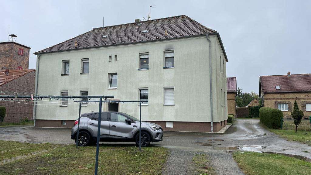 Immobilie in Schipkau - Vermietete Eigentumswohnung mit Gartenanteil und Garage - Bild 0
