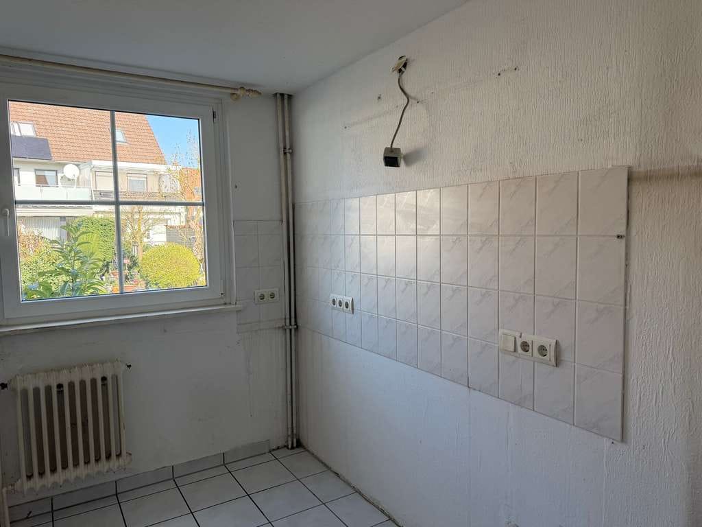 Immobilie in Langenhagen - Ihr neues IMMOBILIEN QUARTIER: charmantes Reihenhaus – bereit für frischen Wind in Engelbostel - Bild 4
