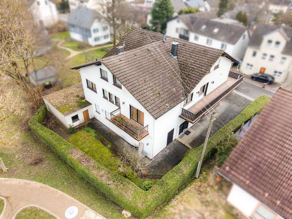 Immobilie in Flammersfeld - Gepflegtes Wohn- und Geschäftshaus in Ortslage von Flammersfeld! - Bild 1