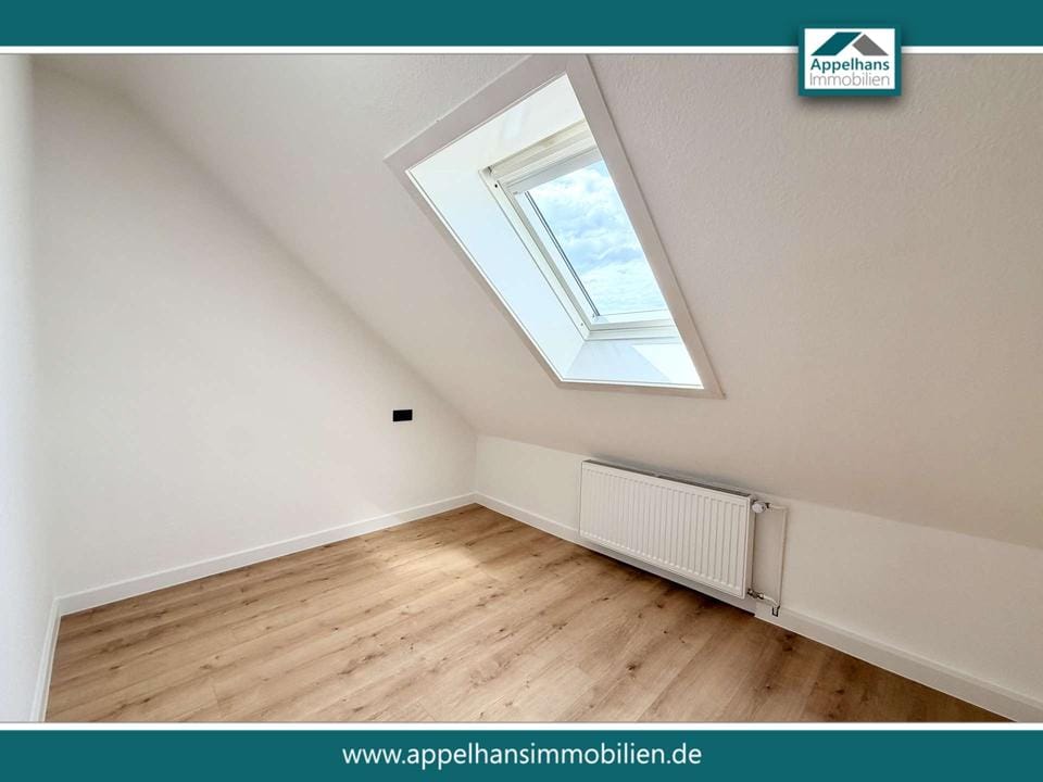 Immobilie in Hilter - Attraktiver Renditechance - frisch sanierte Dachgeschosswohnung - Bild 0