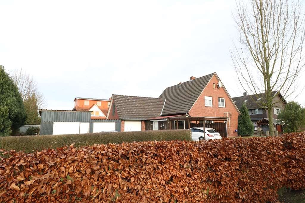 Immobilie in Essen/Oldenburg - Sehr gepflegtes, teilmodernisiertes Wohnhaus mit Keller, Garage, Carport und großem Garten - Bild 1