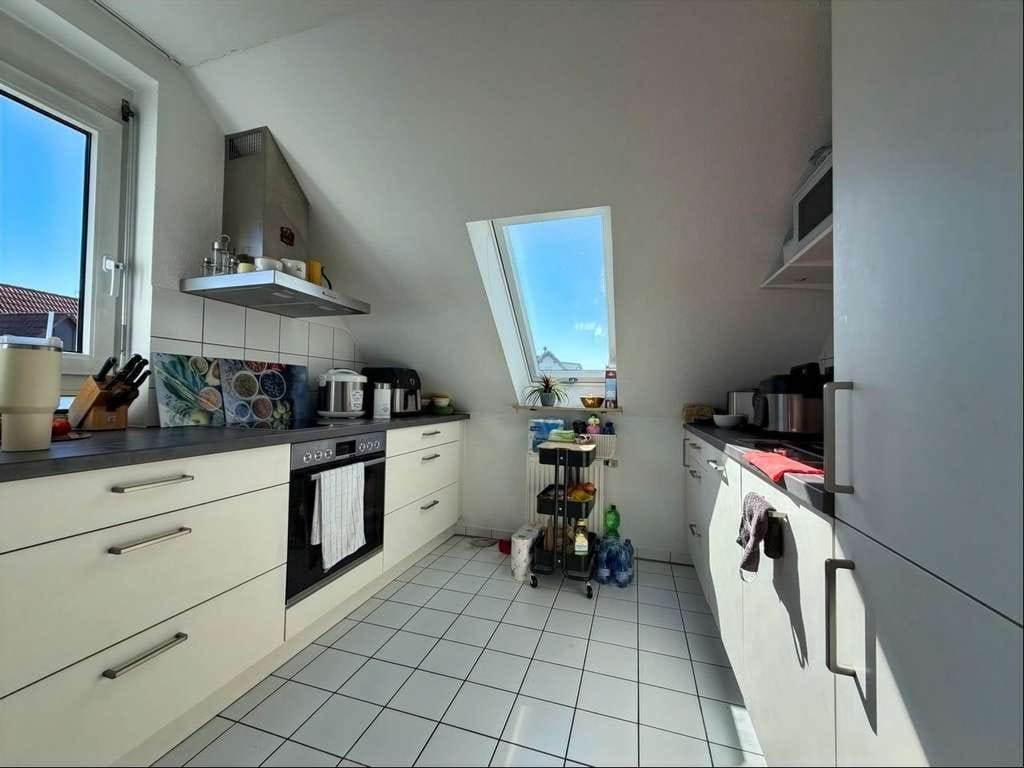 Immobilie in Weissach im Tal - Charmante Dachgeschosswohnung im Herzen von Unterweissach - Bild 1