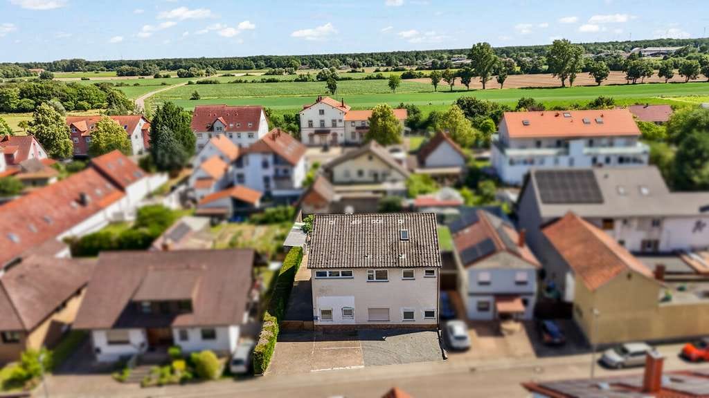 Immobilie in Lustadt - Leer stehendes und breitgefächertes Dreifamilienhaus - Bild 1