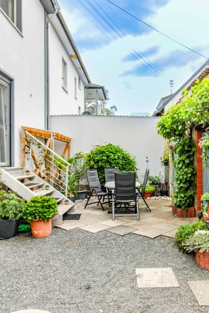 Immobilie in Hadamar - Charmante Doppelhaushälfte mit Terrassen, großem Garten und Ausbaupotenzial in Hadamar-Oberzeuzheim  - Bild 4