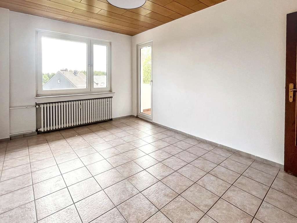 Immobilie in Rösrath - Attraktives Mehrfamilienhaus mit sechs Wohneinheiten, ausgebauter Dachfläche und Garten - Bild 4