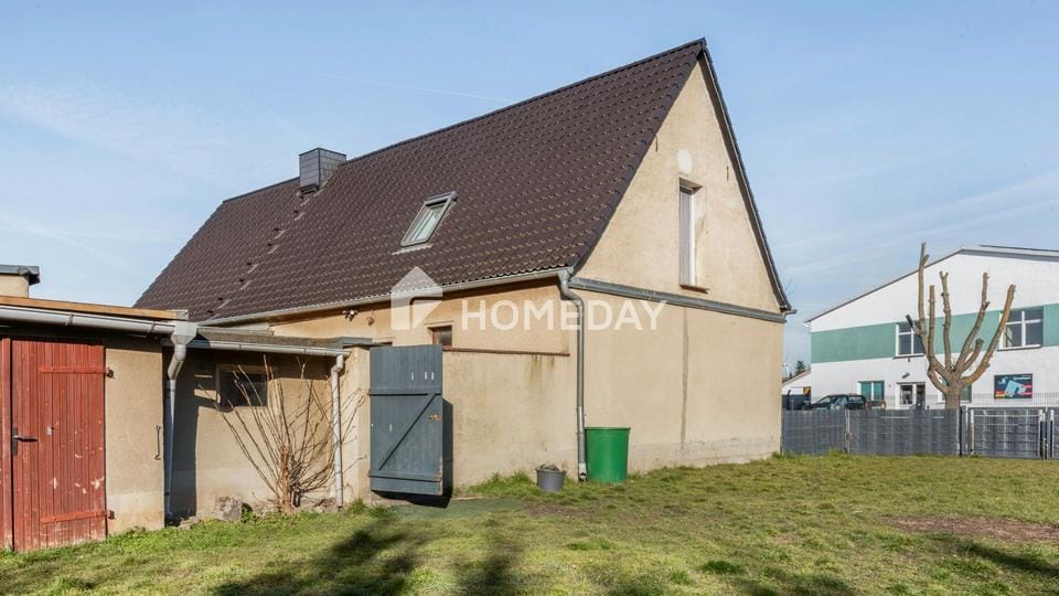 Immobilie in Zörbig - Solide gebaut, modernisiert & vielseitig nutzbar: EFH mit Garage, Nebengebäude und großem Grundstück - Bild 0