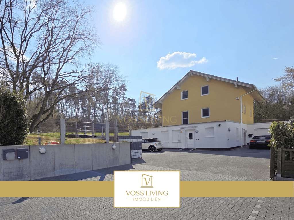 Immobilie in Schöneck - Wundervolles Einfamilienhaus in Waldrand- bzw. Sackgassenlage mit ELW, Garage und KFZ Stellplätzen - Bild 1