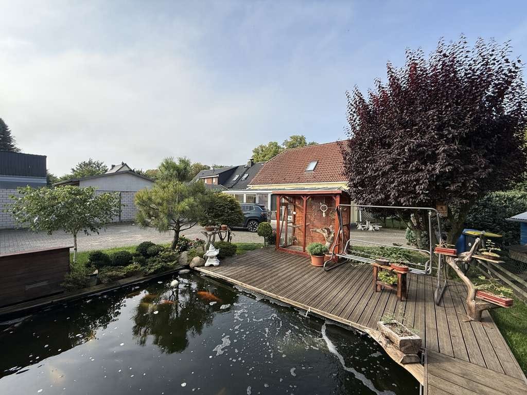 Immobilie in Wusterhausen/Dosse - Charmantes Einfamilienhaus mit großem Garten und Doppelgarage – für Kapitalanleger in Bantikow - Bild 2