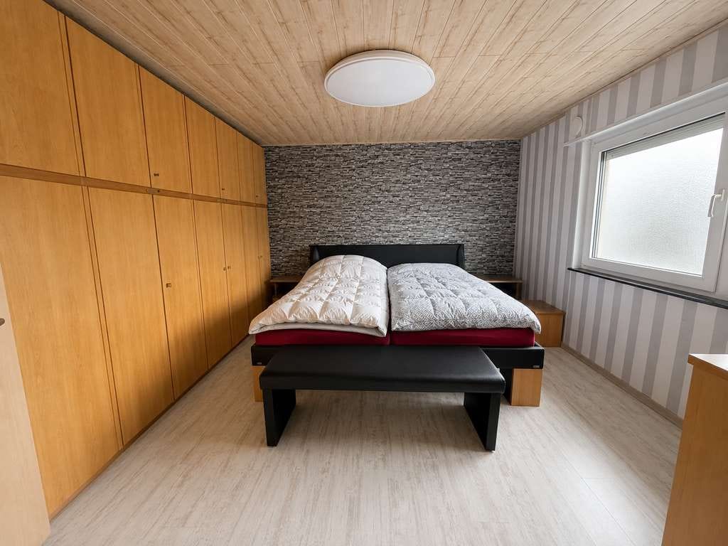 Immobilie in Wattenheim - Einfamilienhaus mit hochwertig modernisiertem Wohnbereich auf 1.080 m² Grundstück Garten/Pool - Bild 3
