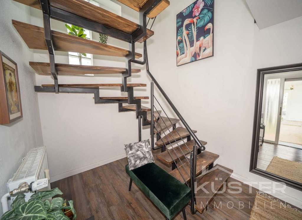 Immobilie in Suthfeld - KÜSTER IMMOBILIEN präsentiert:Exklusives Wohngefühl mit Dachterrasse,Garten und Kamin - Bild 2