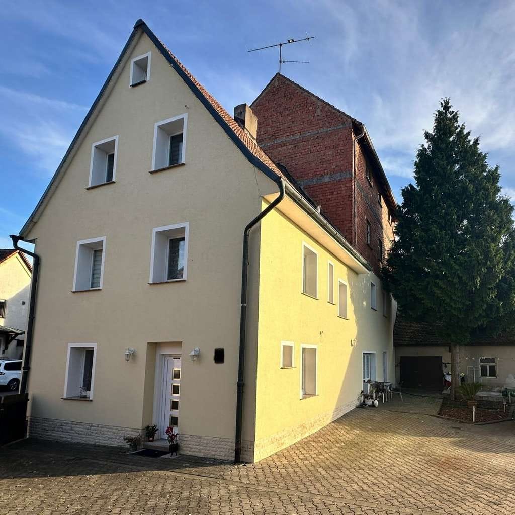 Immobilie in Schlüsselfeld - Gepflegtes EFH mit über 1.000 m² Grundstück, Scheune und Ausbaureserve - Bild 0