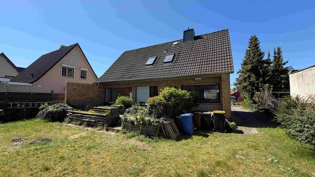 Immobilie in Heist - Familienfreundliches Zuhause mit großem Potenzial – Einfamilienhaus in ruhiger Lage von Heist - Bild 2