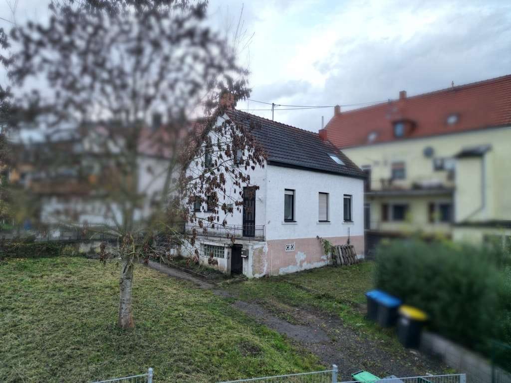 Immobilie in Schiffweiler - Kompaktes Einfamilienhaus mit Potenzial in ruhiger Lage von Schiffweiler - Bild 0
