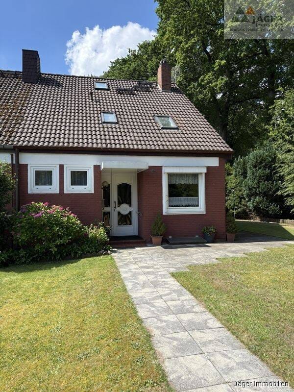 Immobilie in Hude (Oldenburg) - Reihenendhaus mit großem Grundstück, Garage und viel Potenzial - Bild 0