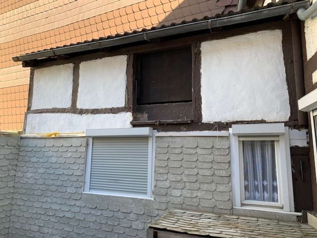 Immobilie in Holzminden - Kleines renovierungsbedürftiges Reihenmittelhaus im Herzen der Stadt   - Bild 2
