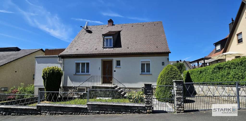 Immobilie in Kleinrinderfeld - Familienfreundliches Zuhause mit Garten, Dachterrasse und Garage in ruhiger Lage - Bild 0