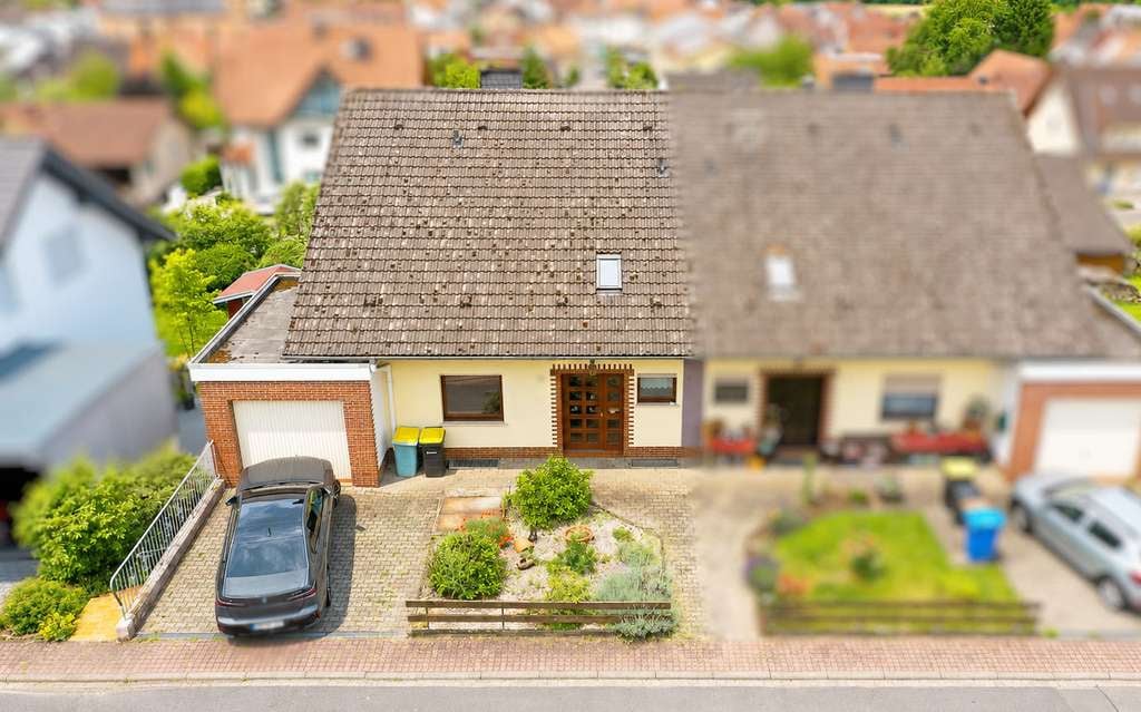 Immobilie in Biebergemünd - Doppelhaushälfte Biebergemünd-Kassel | 172 m² · ELW · PV - Bild 1
