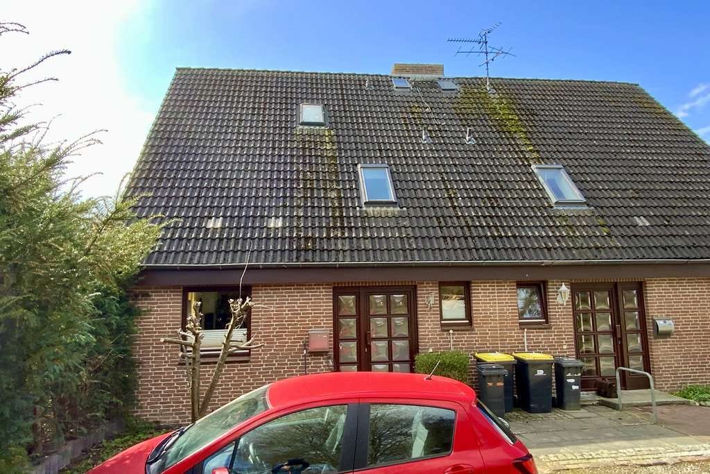 Immobilie in Stockelsdorf - Vermietete Doppelhaushälfte in Feldrandlage für den Kapitalanleger - Bild 1