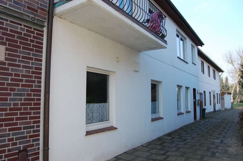 Immobilie in Wildeshausen - Mehrfamilienhaus mit Gewerbeeinheit und Baugrundstück in Wildeshausen - Bild 2