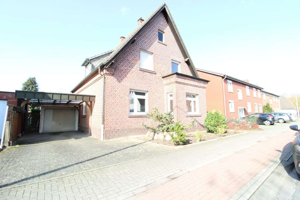 Immobilie in Coesfeld - Wohnglück auf zwei Ebenen: Kaminfeuer, Gartenfreude und jede Menge Raum - Bild 0