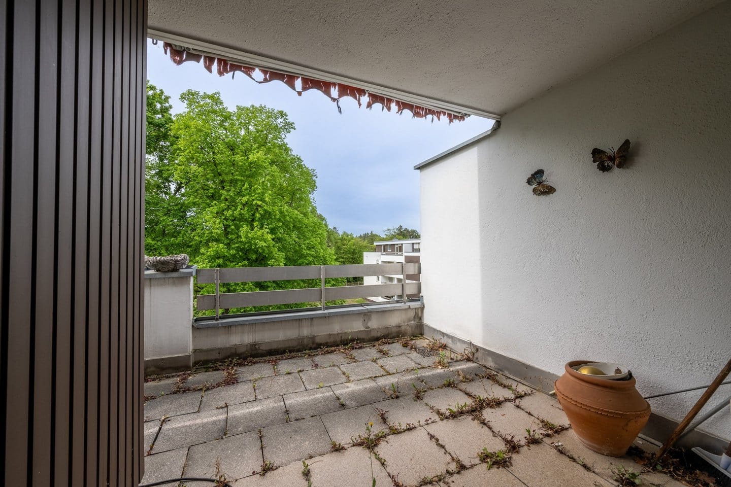 Immobilie in Gräfelfing - Seltene Chance: Helle und renovierungsbedürftige 2-Zimmer-Dachterrassenwohnung mit Garagenstellplatz - Bild 1
